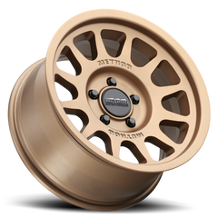 https://serenity-foxfactory.asset.akeneo.cloud/fox_asset_family/media/MRW_703_Bronze_5lug_Studio_Layback.png