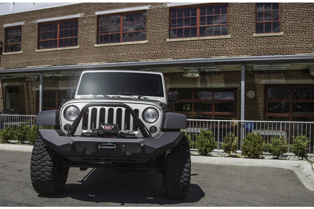 https://serenity-foxfactory.asset.akeneo.cloud/fox_asset_family/media/cwl_jk10301_lifestyle_01_jeep_jk_pyro_fullwidth_bumper.jpg