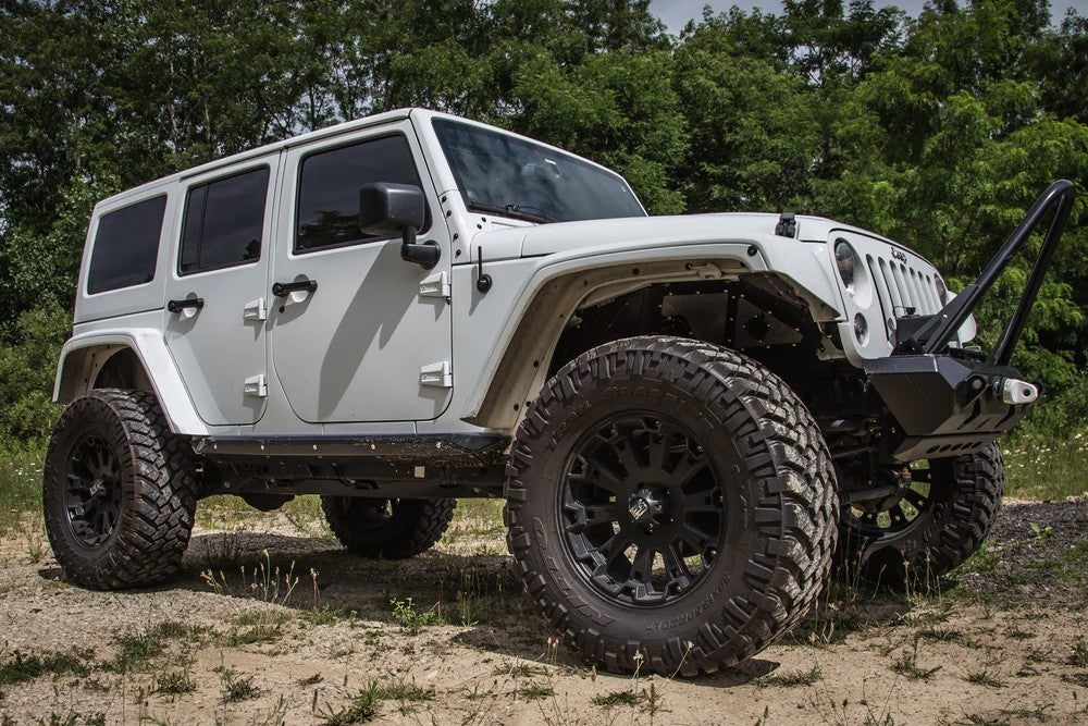 https://serenity-foxfactory.asset.akeneo.cloud/fox_asset_family/media/cwl_jk41401_lifestyle_01_jeep_jk_4dr_rocker_guard.jpg