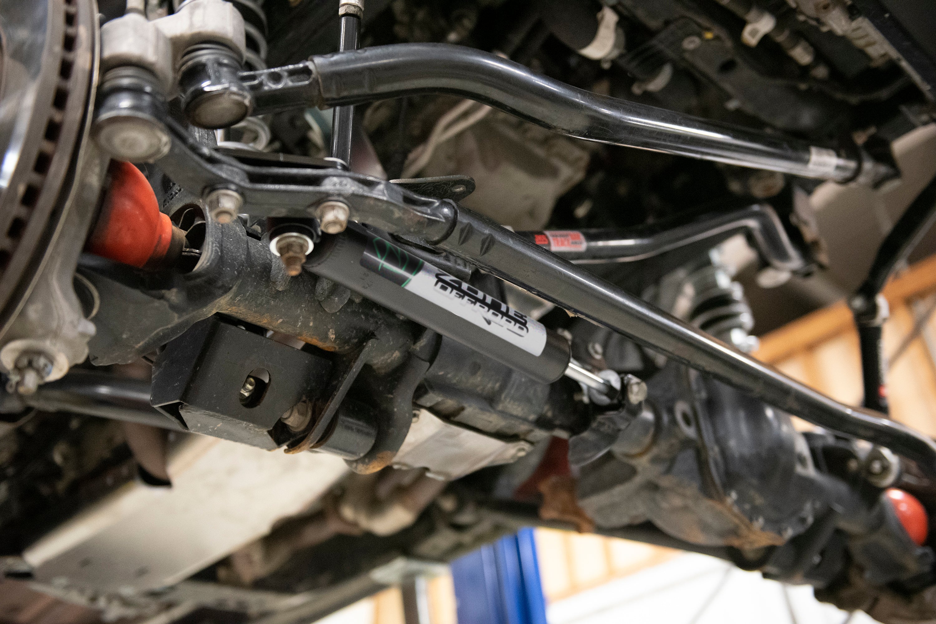 https://serenity-foxfactory.asset.akeneo.cloud/fox_asset_family/media/zone_7420_jeep_steering_stabilizer_rotation_2.jpg